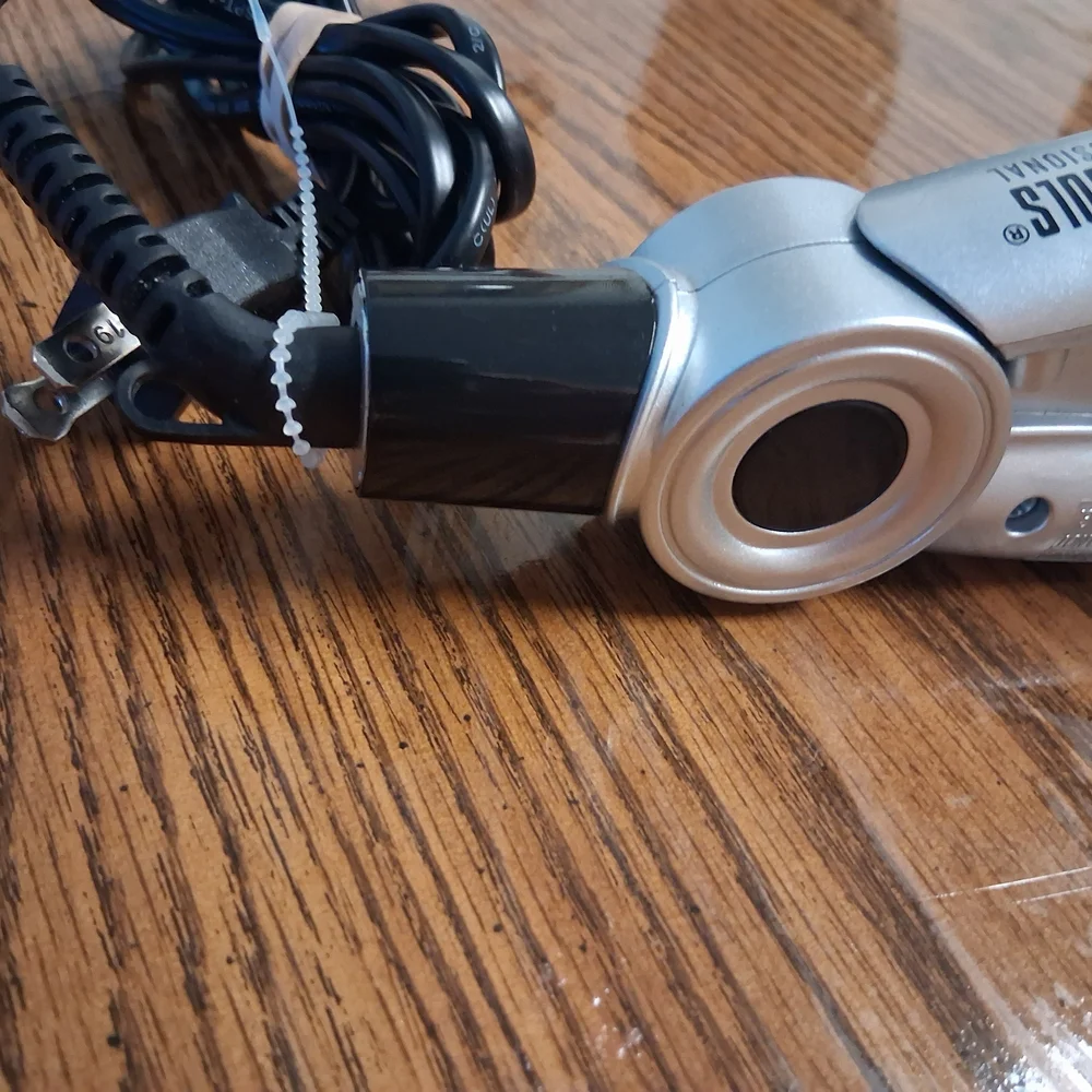 Sleek Silver Hair Styling Tool